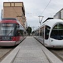 DSC09839  Lyon Part-Dieu: tram Rhône-Express pour l'aéroport à droite et Tram T3 à gauche