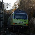 DSC22751  Re 465 001-6 en queue d'un RE Bern - La Chaux-de-Fonds, à côté du bâtiment technique du nouveau tunnel de Rosshäusern.