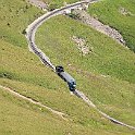 IMG 3742  La loc numéro 6 avec une voiture historique dans la grande courbe en-dessous du sommet