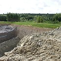 DSC14949  Carrière dans le Mädersfrost qui permet de gagner les matériaux nécessaire à la fabrication du béton et qui sera rebouchée par les matériaux d'extraction