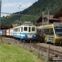 DSC22280  Une 7000 avec un région Zweisimmen - Lenk dépasse la Be 4/4 1003 à Matten